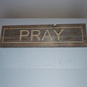 Wood Sign with engraved word  PRAY.  Was cut from reclaimed wood